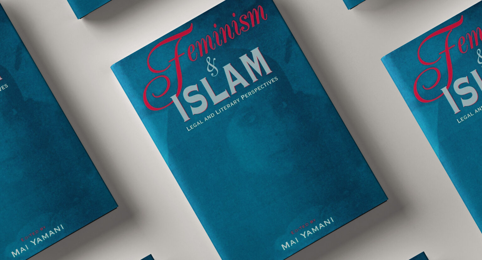 Image of several copies of Feminism & Islam book